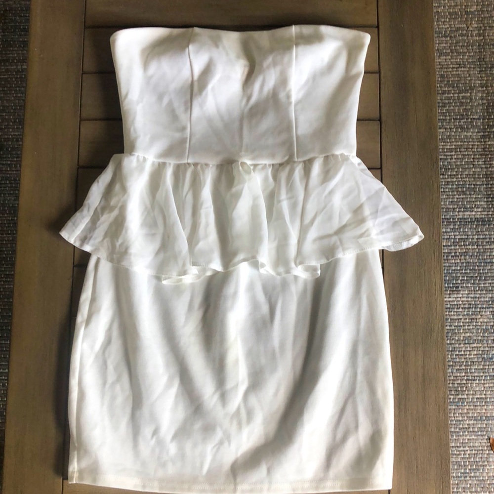 White peplum dress